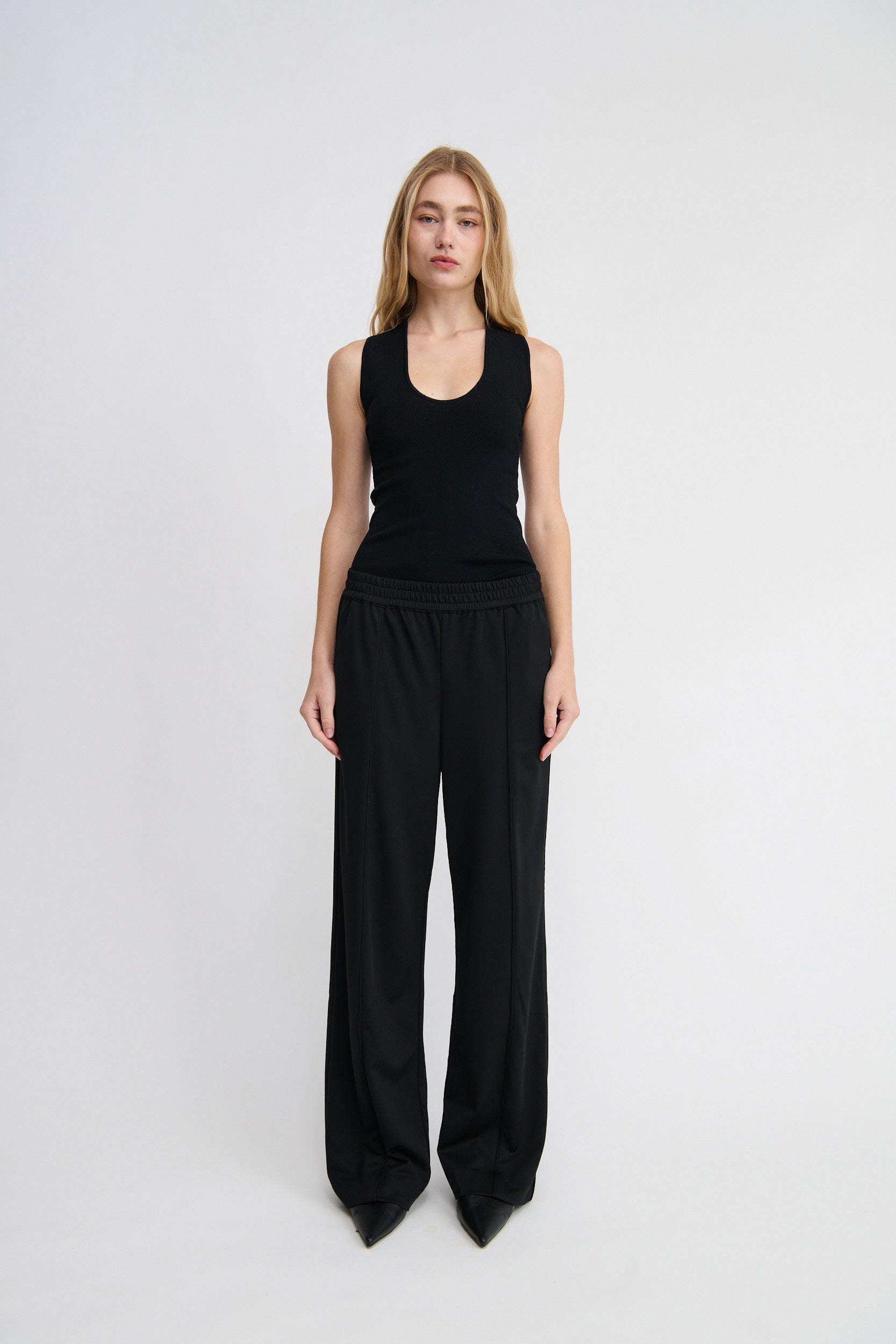 elastic waistband black pants with pipping detail and pockets, ladies